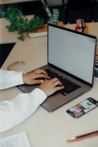 Creating Compelling Content That Convert (Post Sample) 9 young woman typing on keyboard at desk 2023 11 27 05 23 33 utc result 11zon - Creating Compelling Content That Convert (Post Sample)